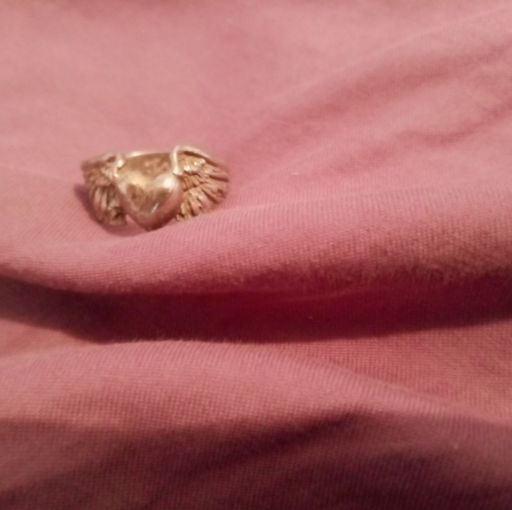 Alex Streeter  flying heart ring best offer